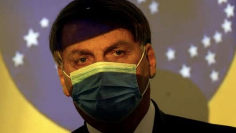 Bolsonaro a repórter: 'Vontade de encher a boca de porrada'